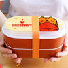 Lunch box dans mains